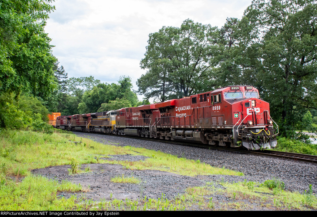 CP 8959 leads an intermodal north at Country Road 13 